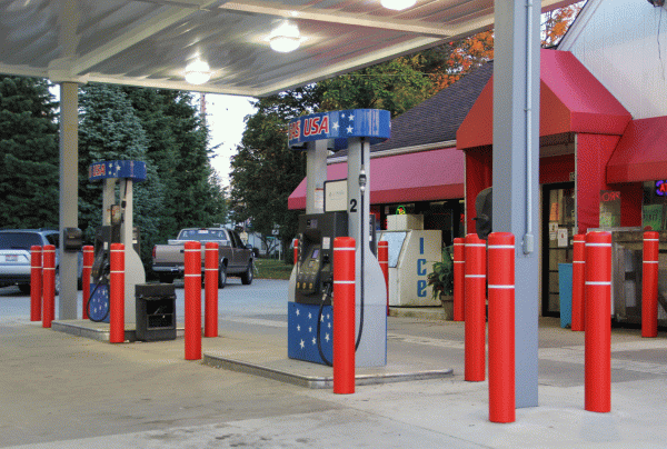 Photo of a gas station with bollard sleeves